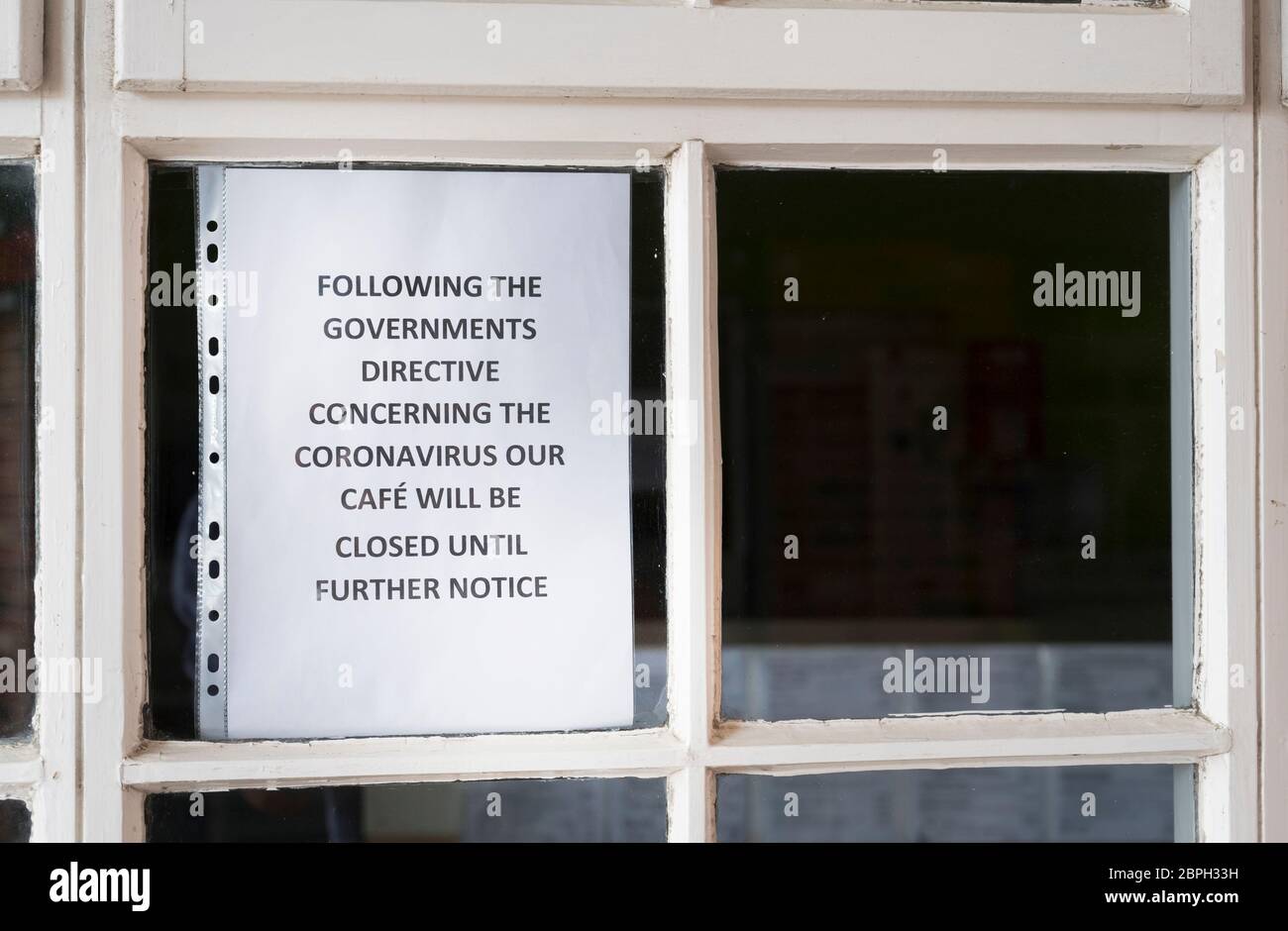 Customer notice in a cafe window during the Covid-19 pandemic,  Market Harborough, Leicestershire, England. Stock Photo