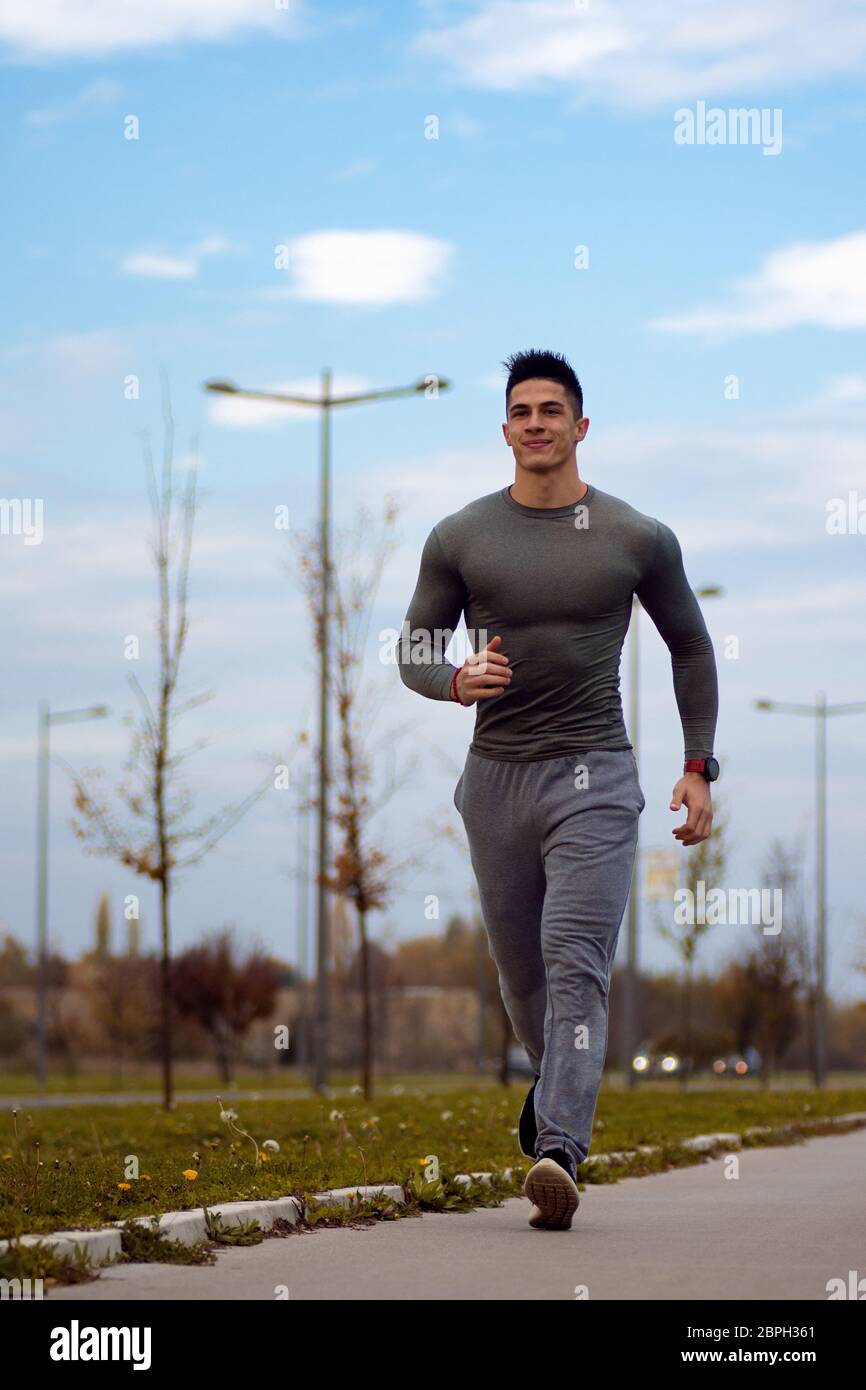 Handsome young sporty man hi-res stock photography and images - Alamy