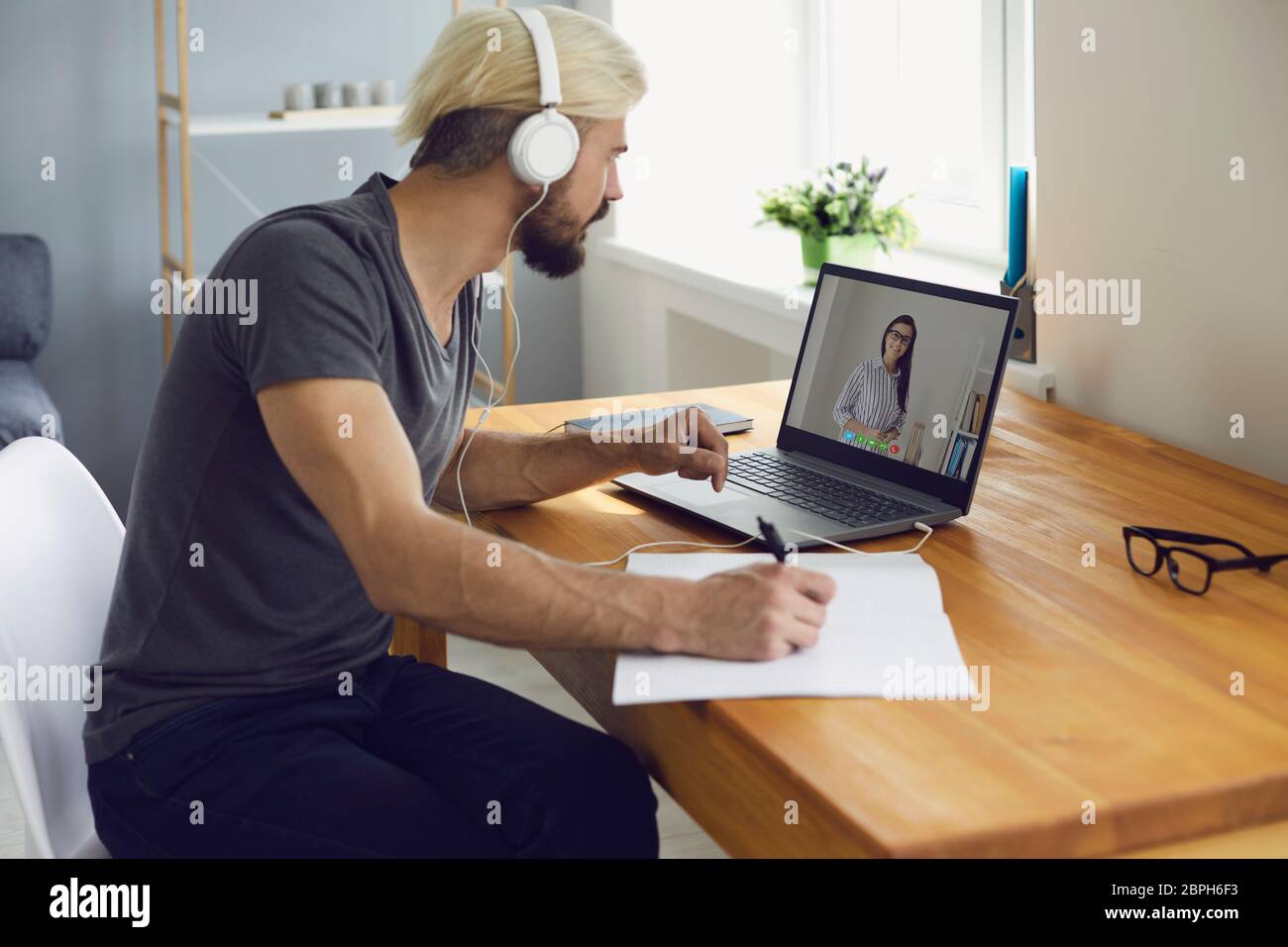 University College Online Education A Guy Student In Headphones