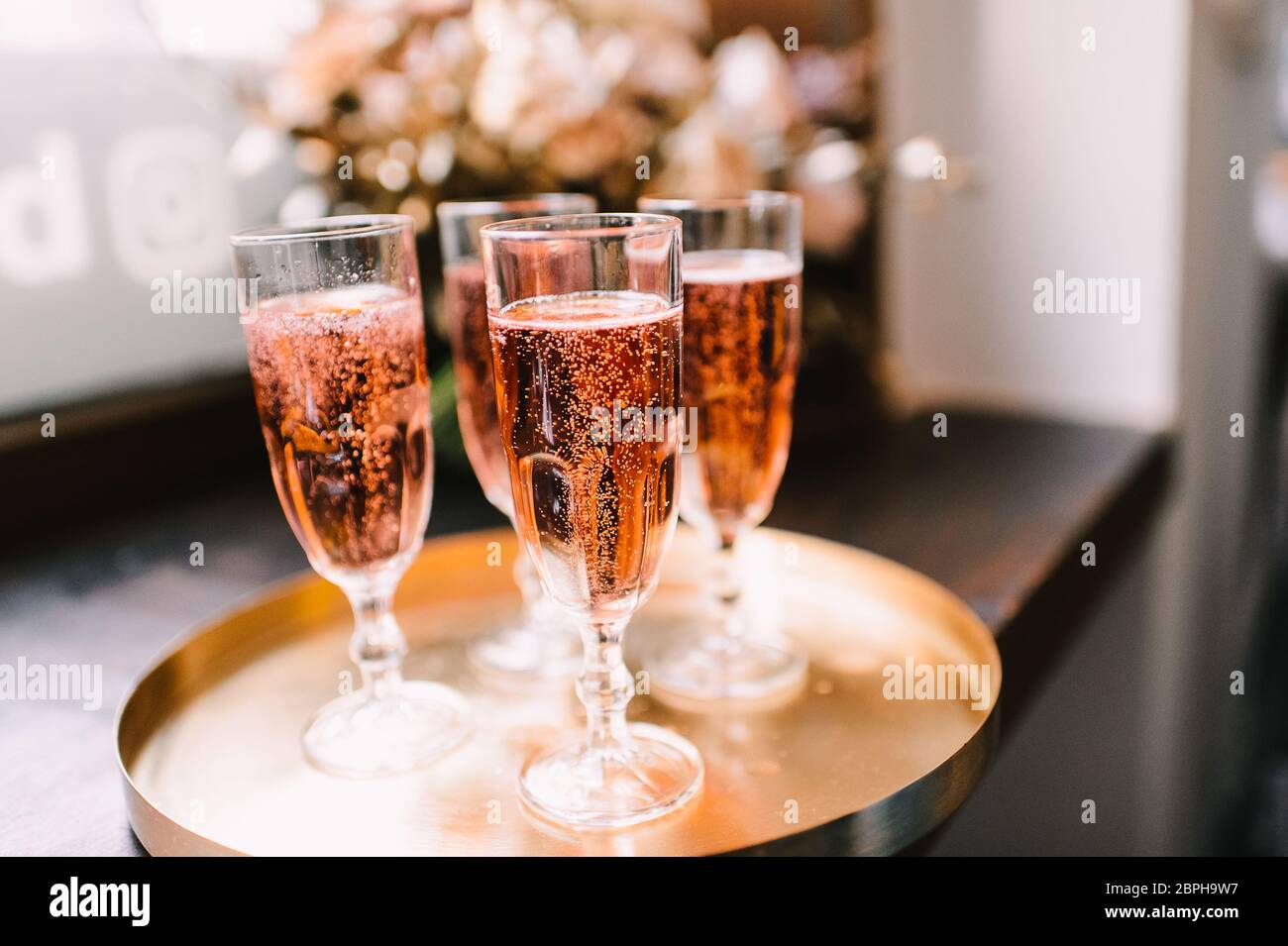 Four champagne glasses hi-res stock photography and images - Alamy