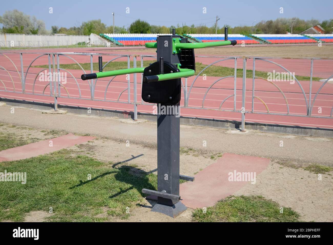 The simulator for swinging the press by lifting the legs. Sports camp at the stadium. Stock Photo