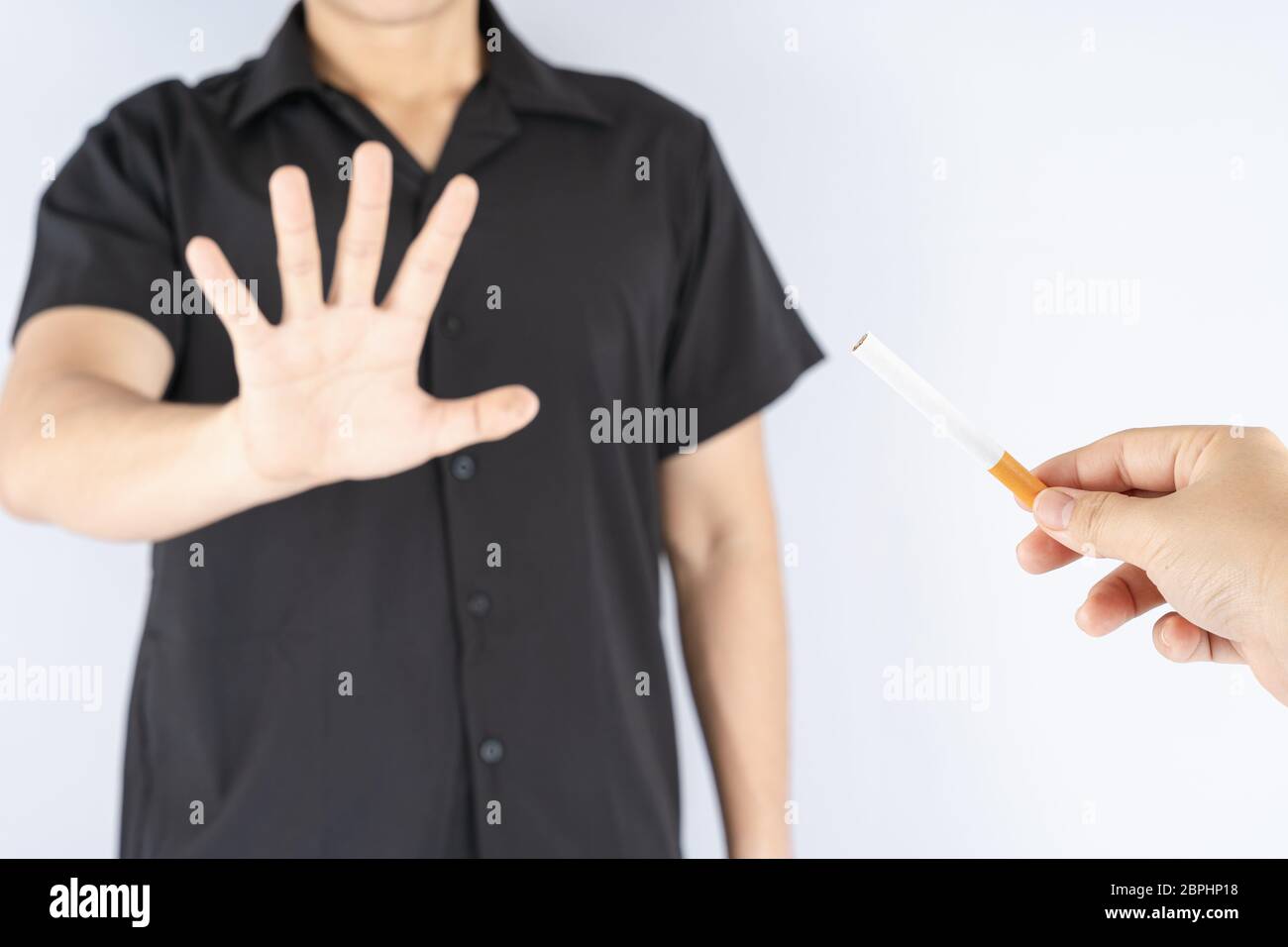 Healthy young man refusing to take cigarette quit of smoking concept ...