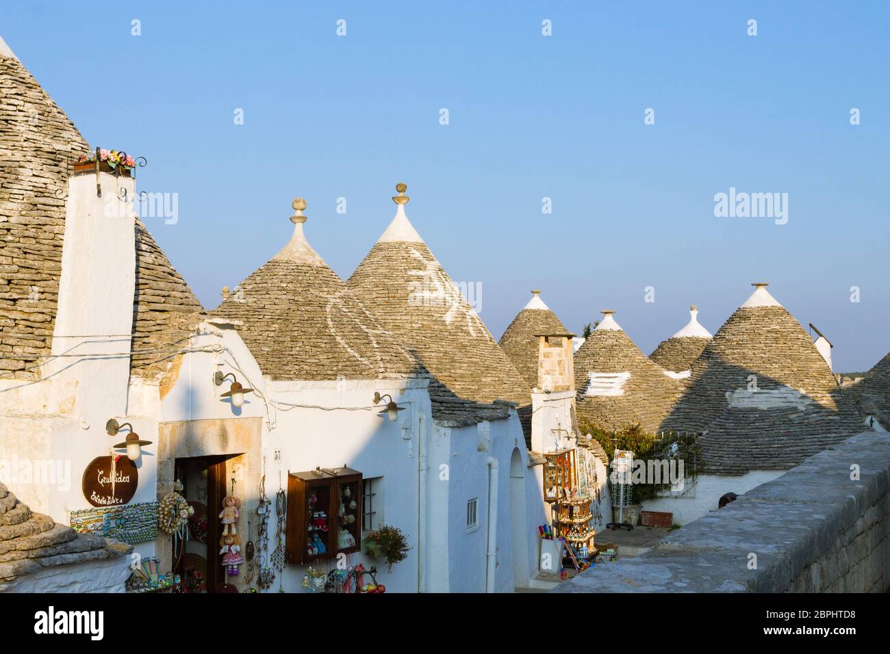 View of Alberobello with trulli roofs and terraces, Apulia region ...