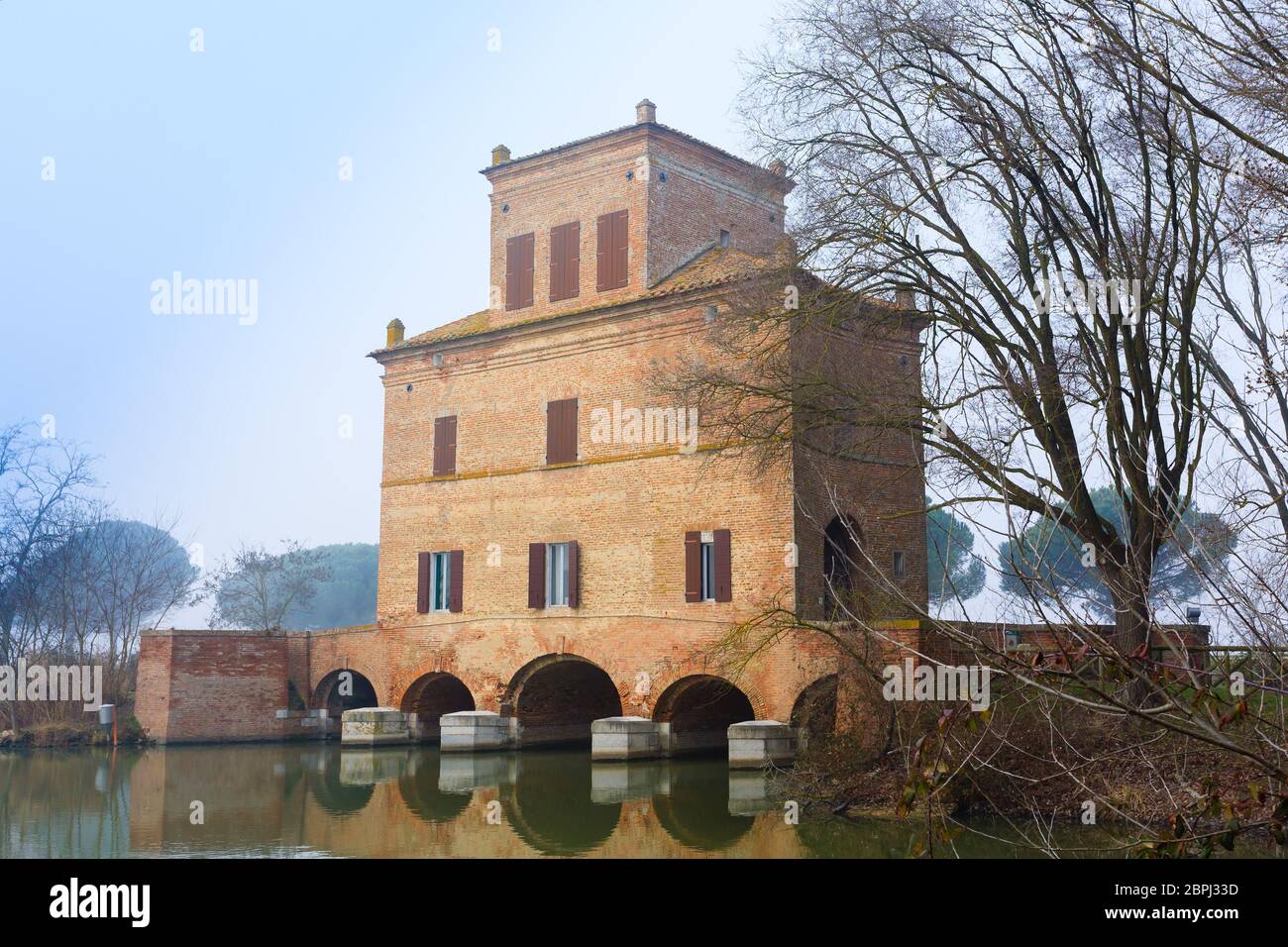 Ancient building from Po river lagoon. Po Delta wetlands landmark ...
