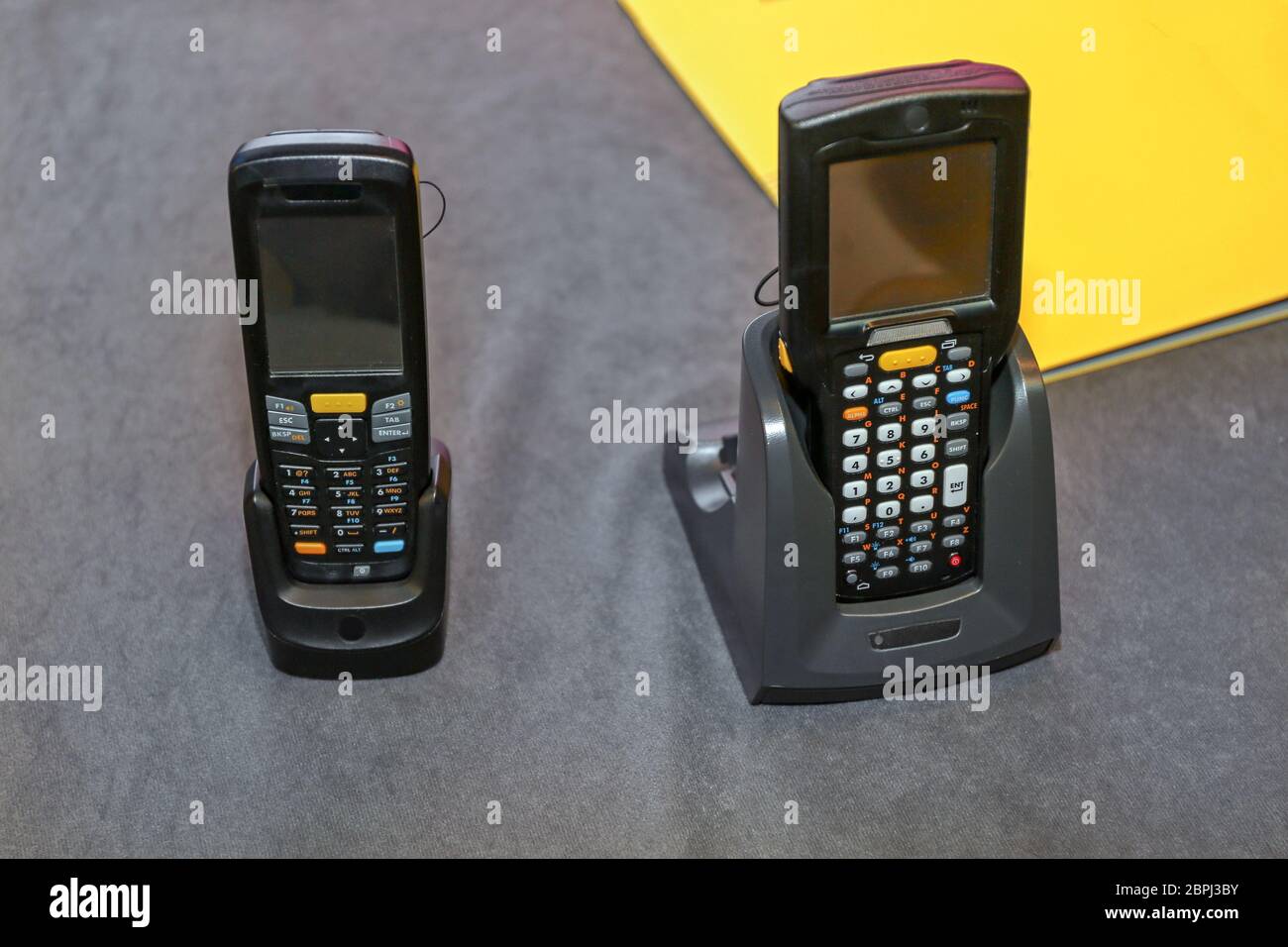 Portable Handheld Barcode Scanner Reader Device and Mobile Phone Stock ...