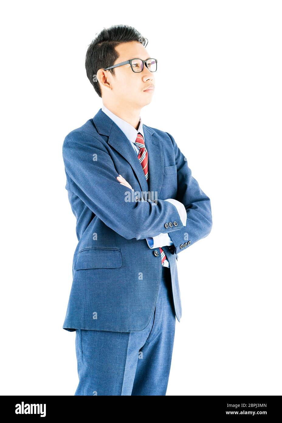 Young asian businessman portrait in suit and arms crossed over white ...