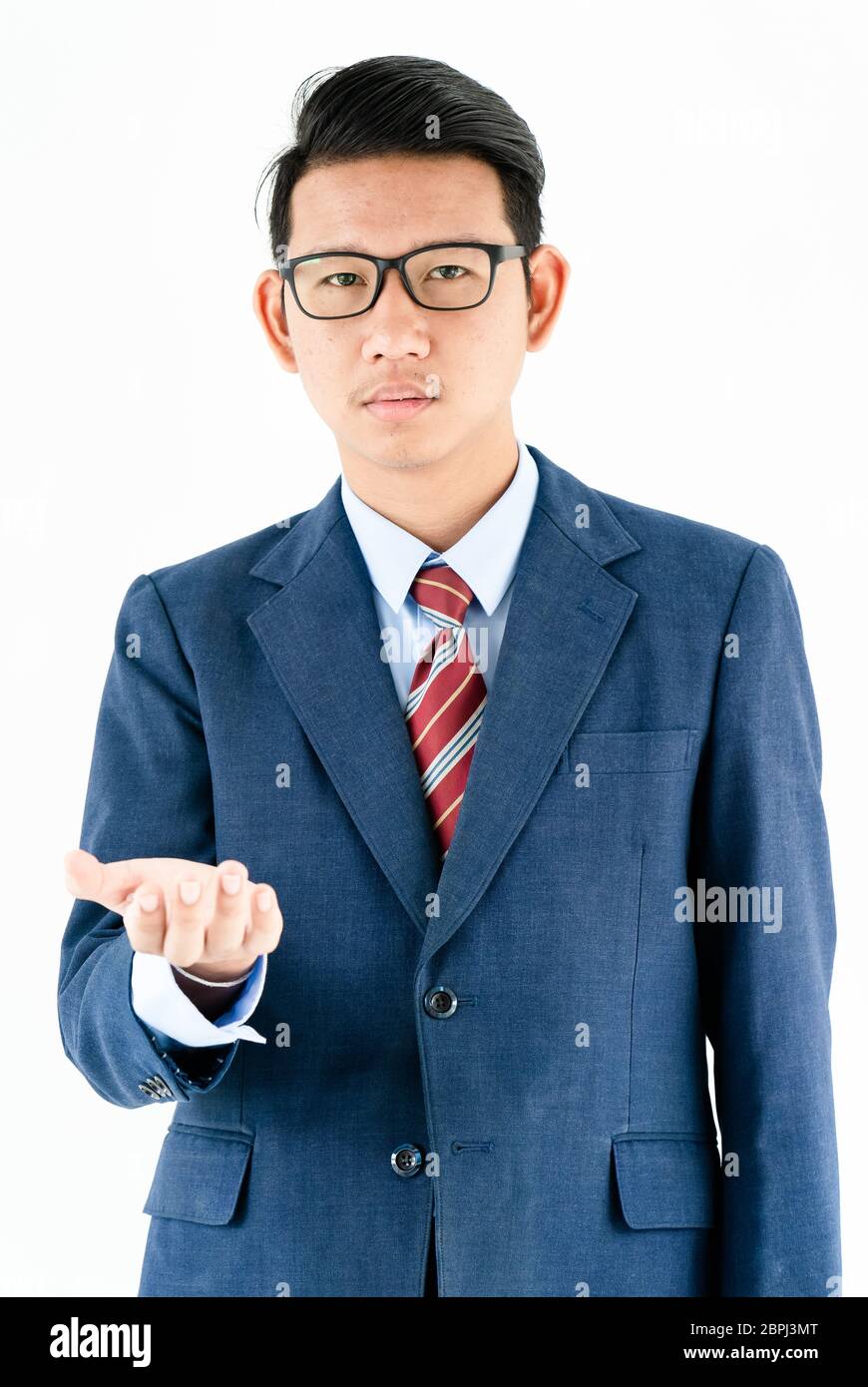 Young asian businessman portrait in suit and wear glasses over white ...