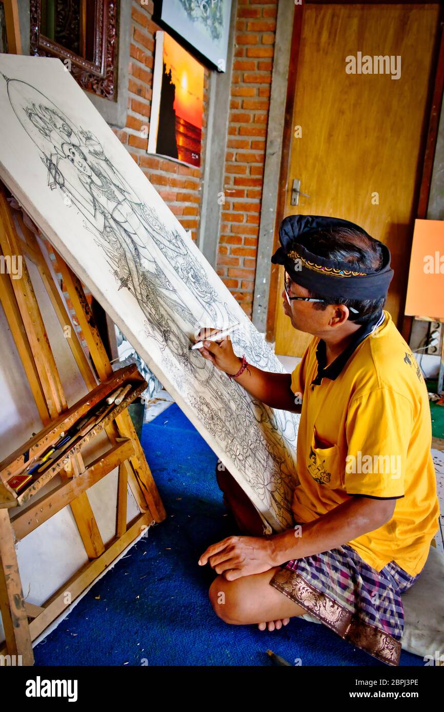 Artist drawing in artistic painting workshop in Ubu, Bali Island. Stock Photo