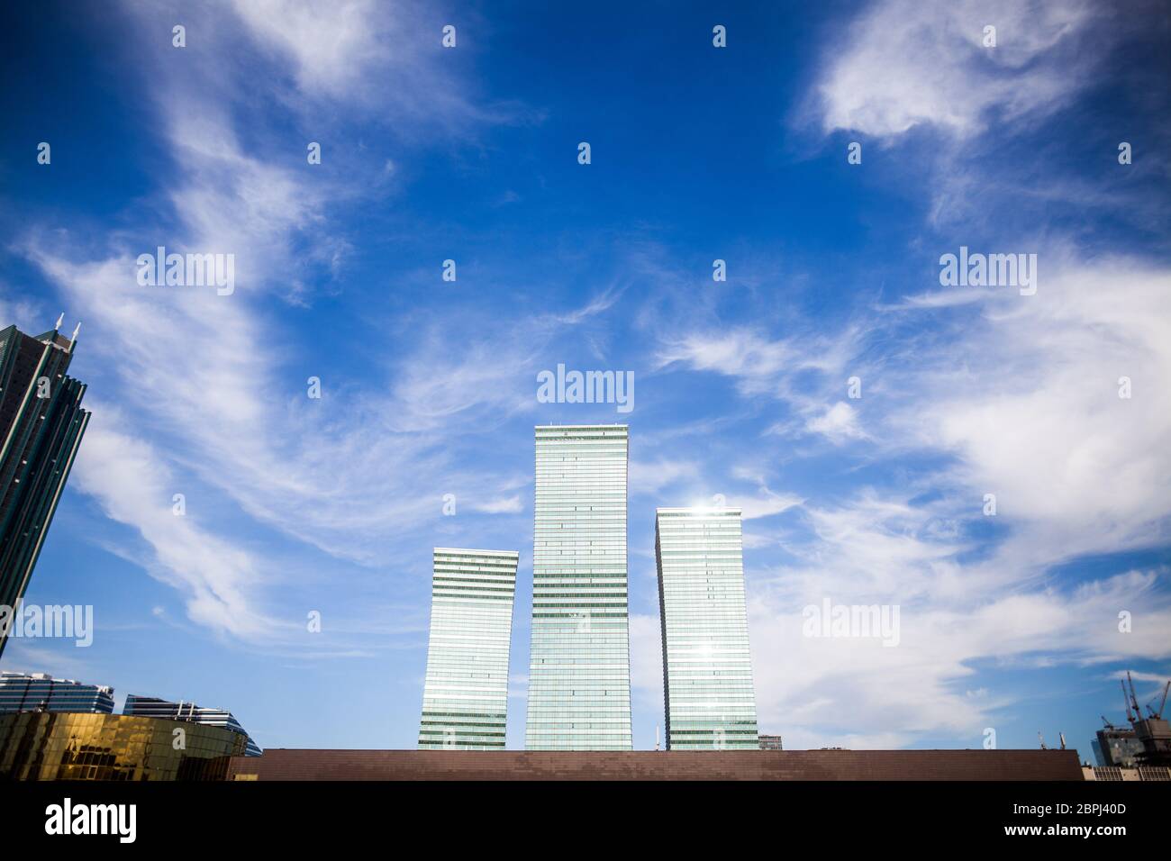 Color image of some modern office buildings and a cloudy sky Stock ...