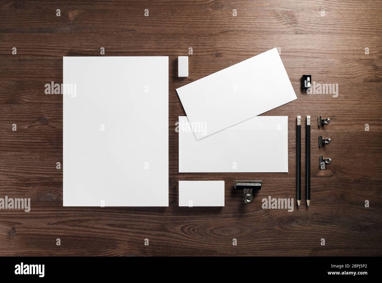 Blank corporate stationery template on wooden background. Responsive
