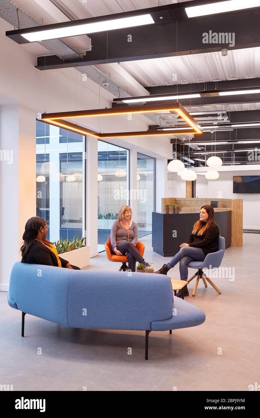 Contemporary UK office interior with primary coloured furniture. UK