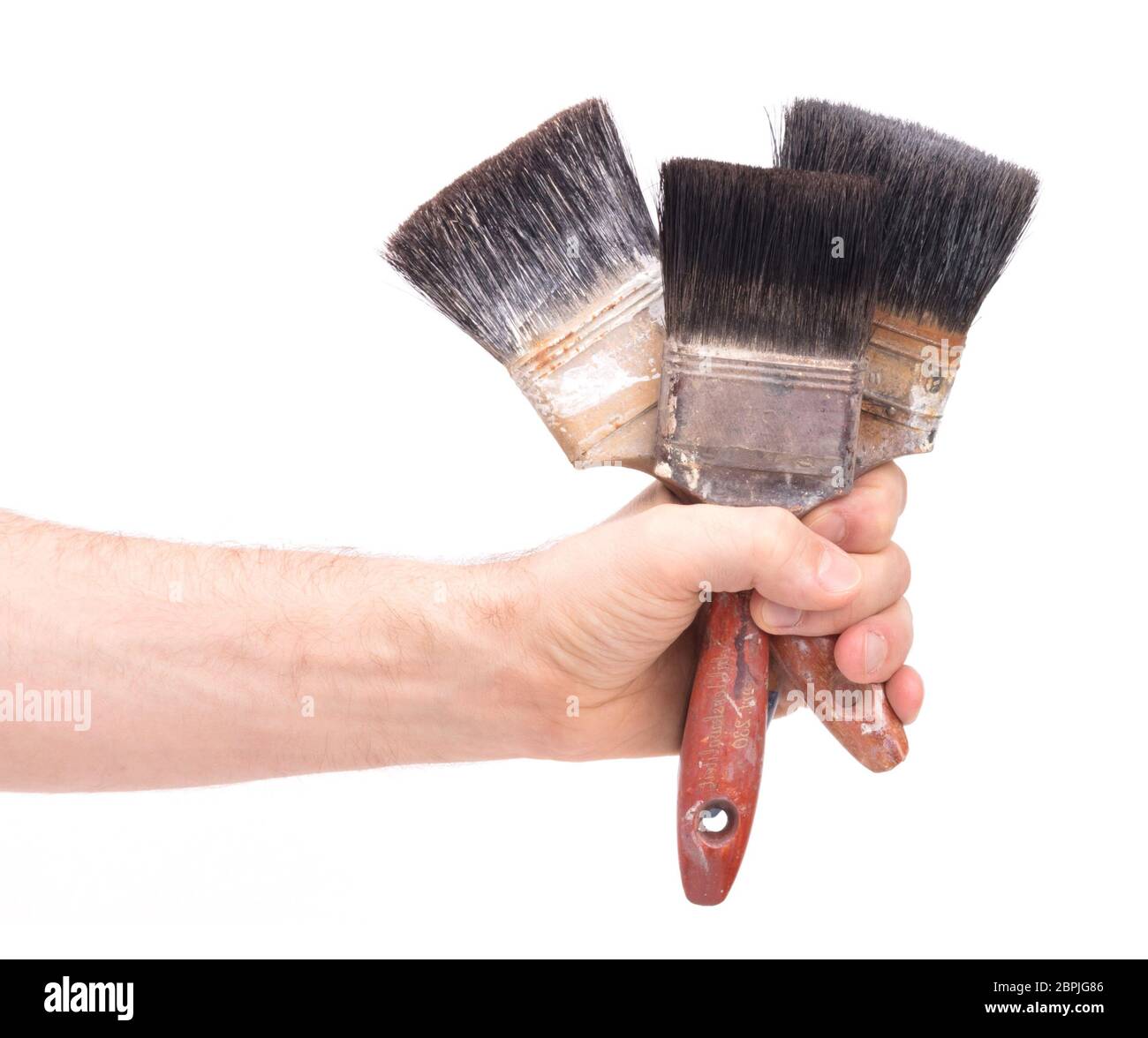 Old paintbrushes isolated on a white background Stock Photo