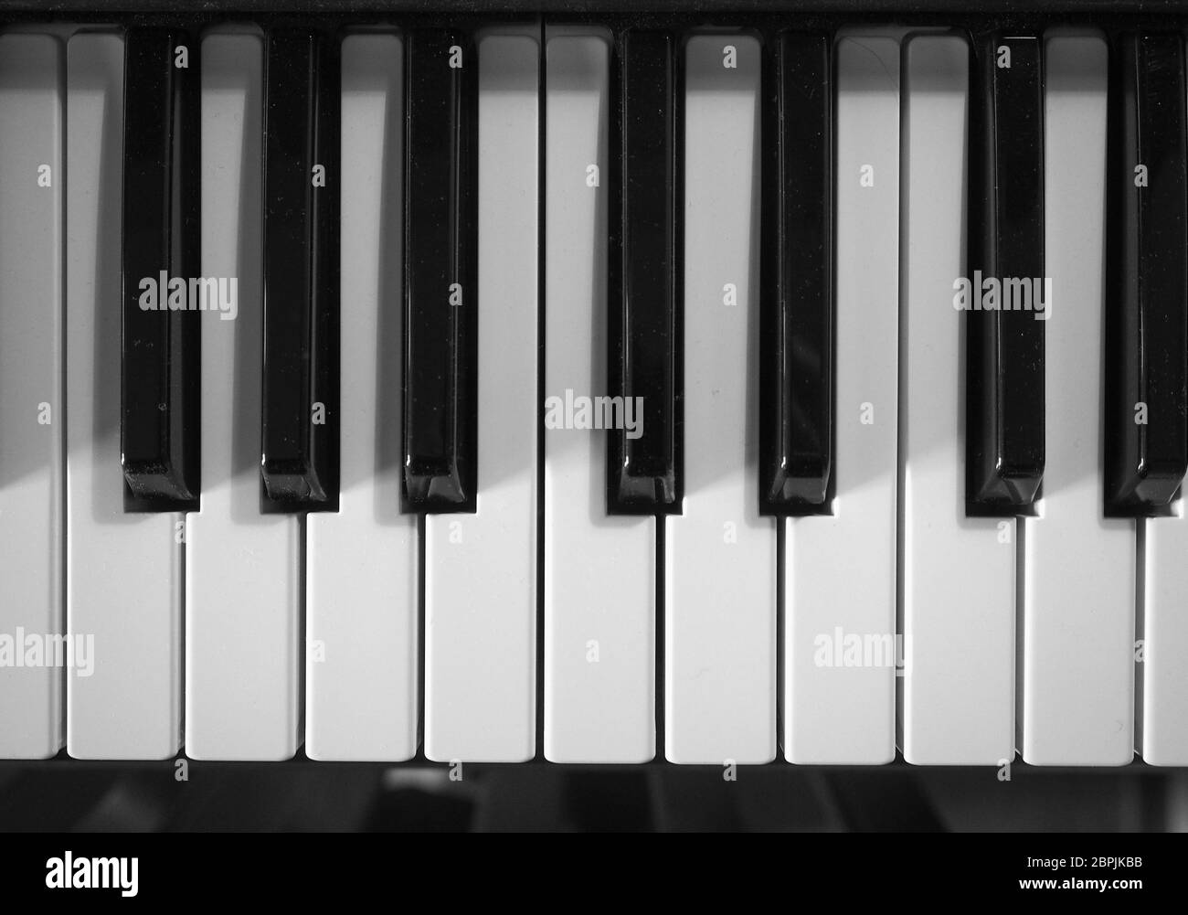 black and white keys of electronic keyboard music instrument Stock