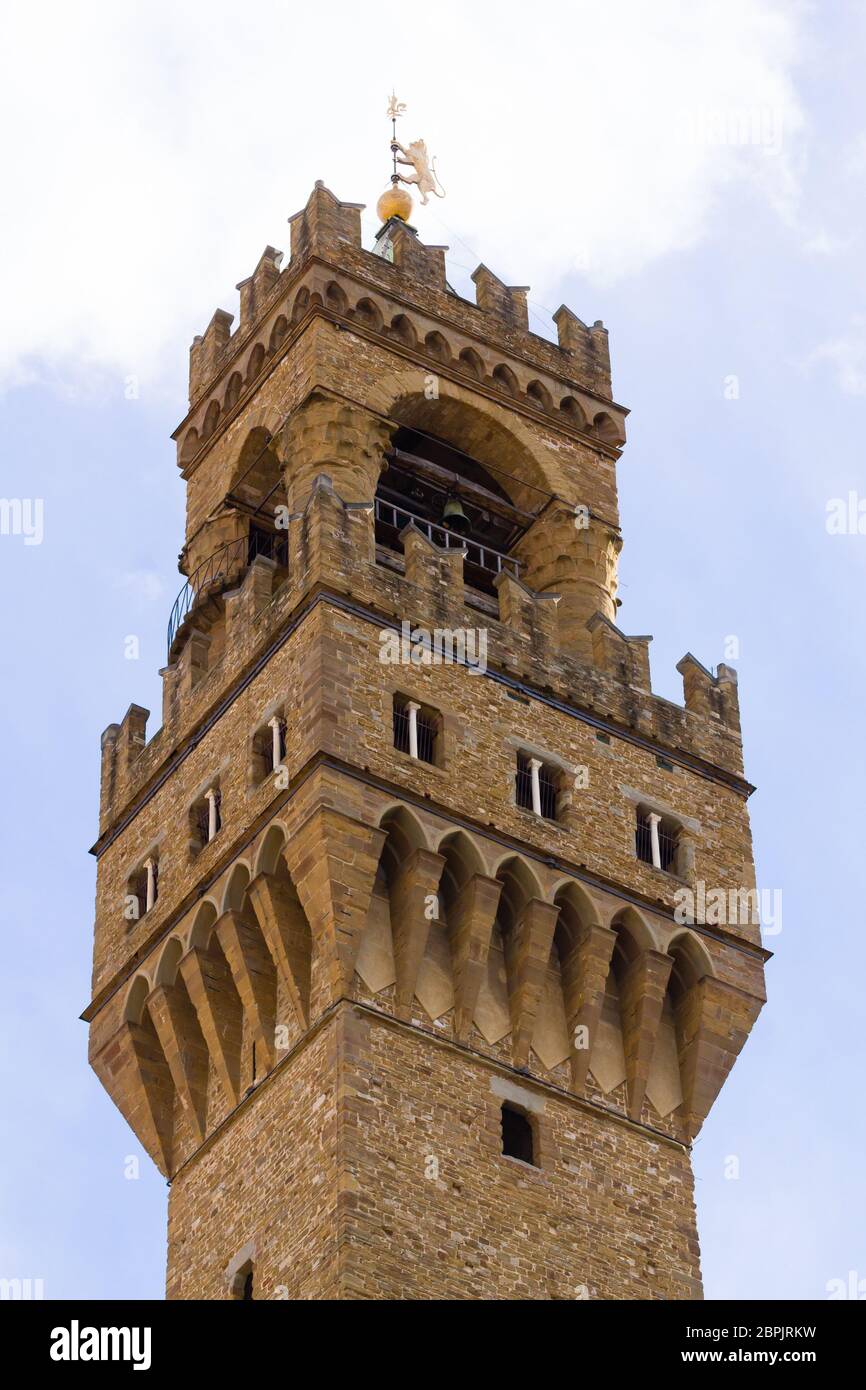 Old Palace bell tower detail view, Florence, Italian panorama. Palazzo vecchio bell tower Stock Photo
