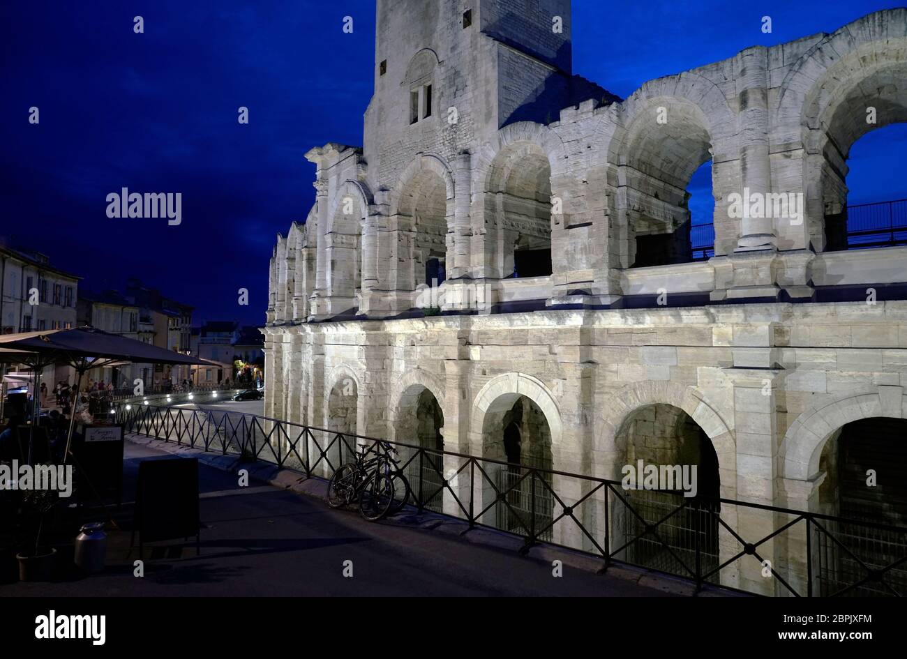 The night view Arles Amphitheatre with medieval tower.Arles.Bouches-du ...