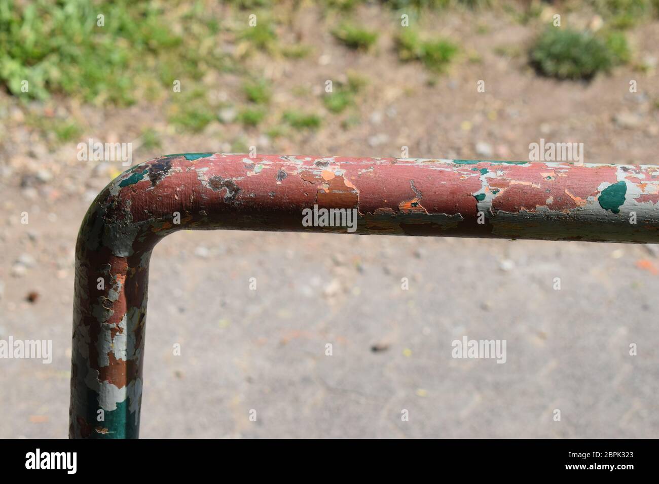 rusty old handle on a station stairway Stock Photo