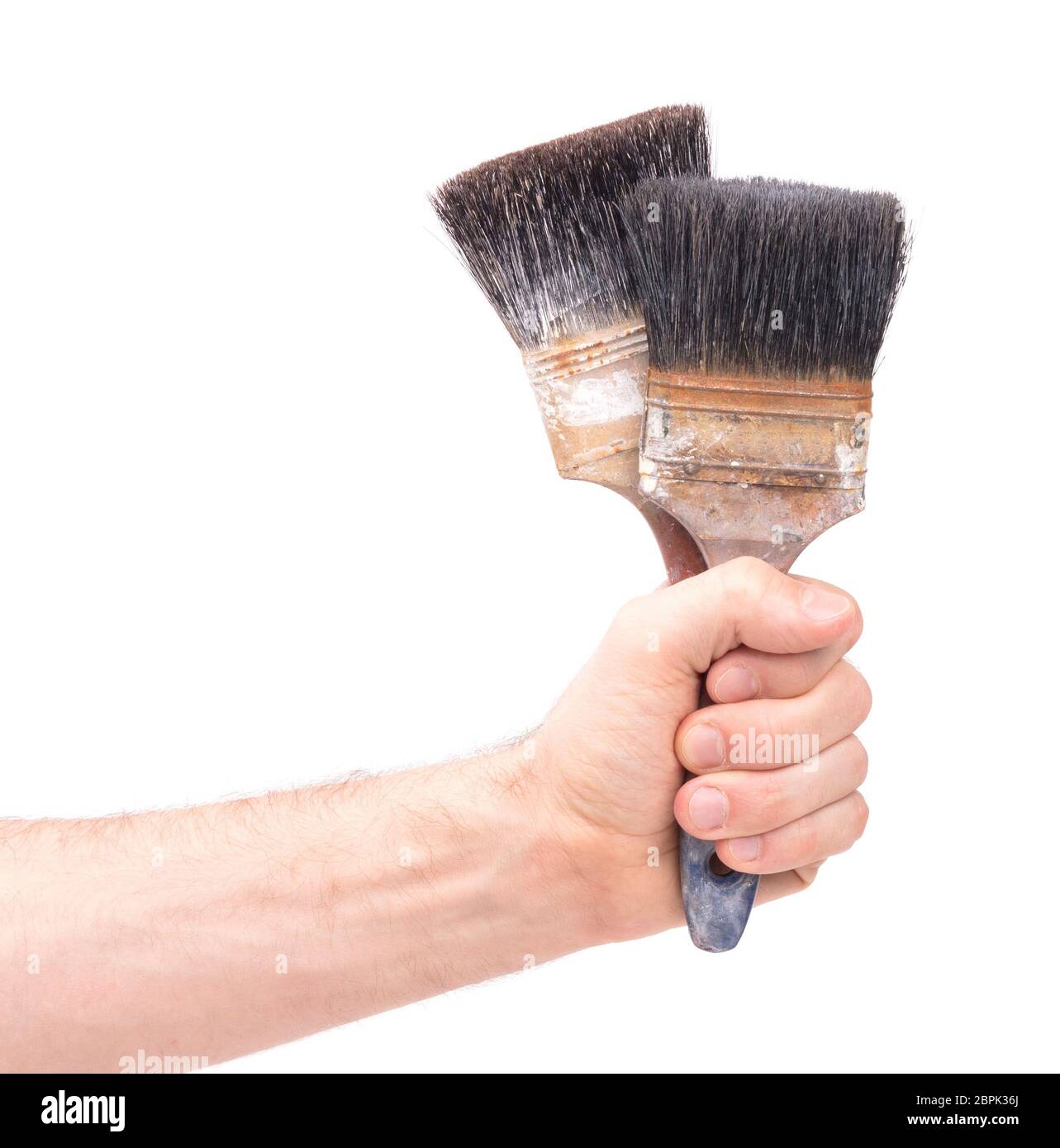 Hand Holding Big Paintbrush Isolated On White Stock Photo