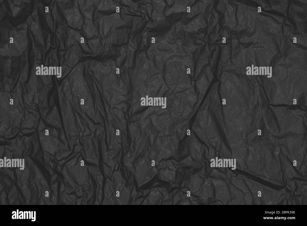 Black crumpled craft matte paper background Stock Photo Alamy