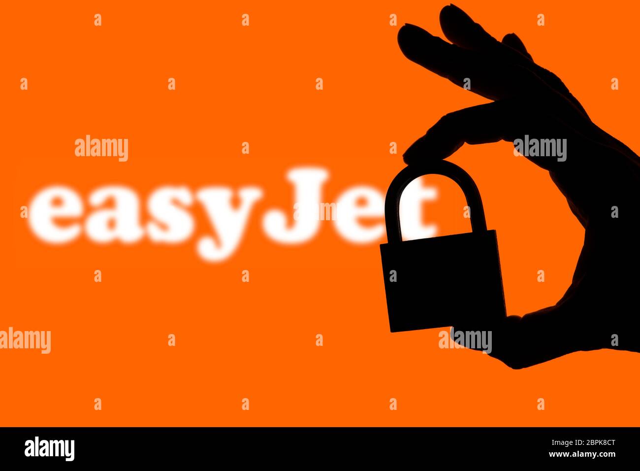 LONDON, UK - April 19th 2020: Easyjet airline company logo with security padlock Stock Photo