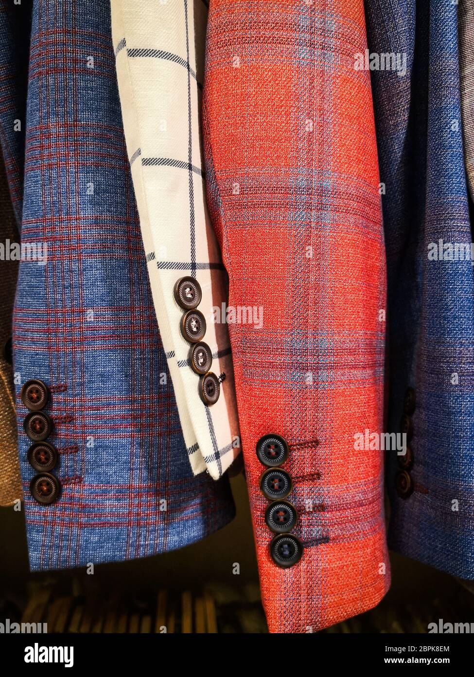 Coats hanging up hi-res stock photography and images - Alamy