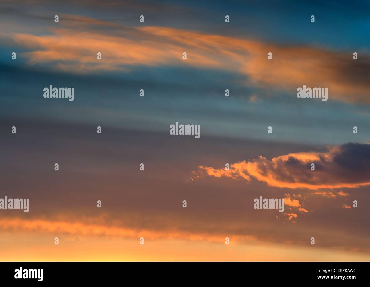 Right aligned sunset cloudscape background Stock Photo - Alamy