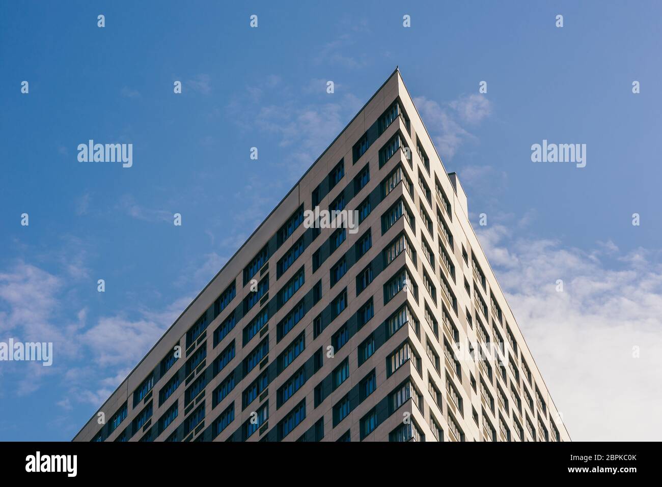 Angle of the Skyscraper on the Cloudy Sky Background Stock Photo - Alamy