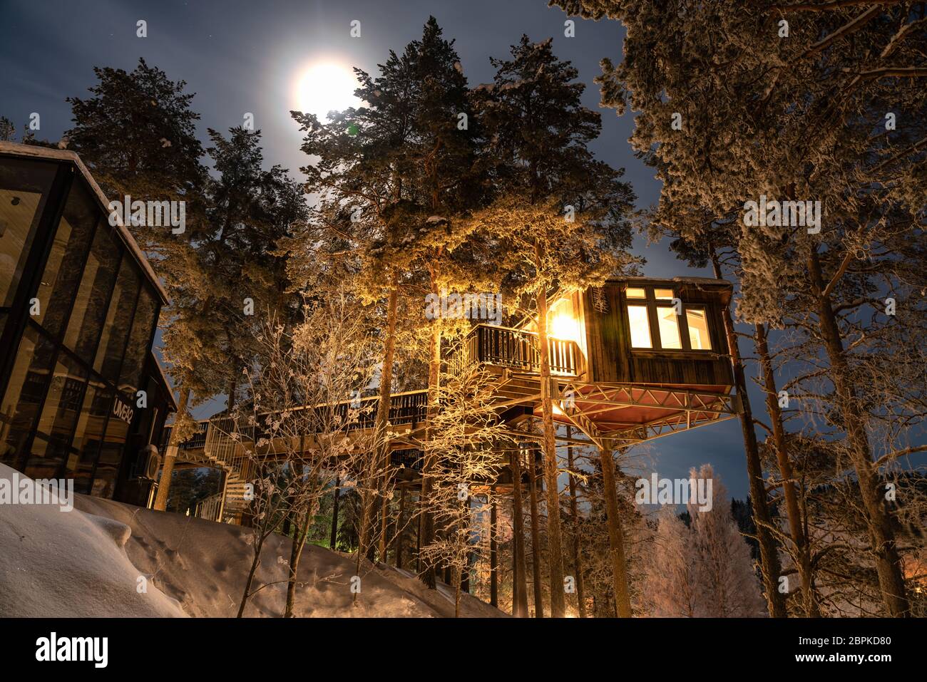 GRANO, SWEDEN FEBRUARY 08, 2020: Winter night closeup view at Birds Nest house up among the trees top in Grano Beckasin, Sweden. Birds nest Stock Photo