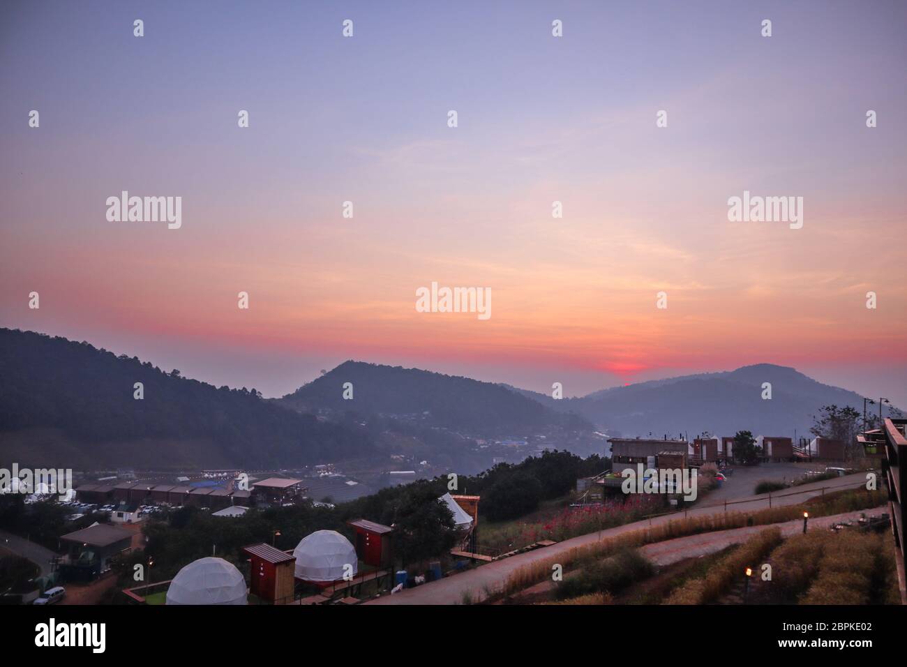Mountain sunset in a thai village near mountains in Chiang Mai Stock Photo