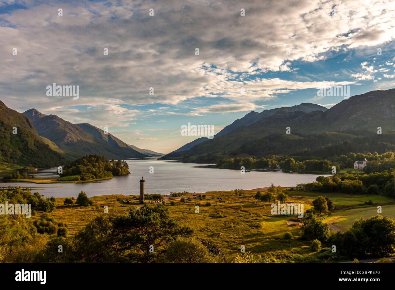 Loch Shiel with statue of Bonny Prince Charly in Glenfinnan, Scotland. Scotland, Glenfinnan, Loch Shiel. Here is the monument of Bonnie Prince Charlie, who proclaimed the second Jacobite uprising at this place in 1745. This struggle for independence from England was already defeated in 1746 in the Battle of Culloden Stock Photo