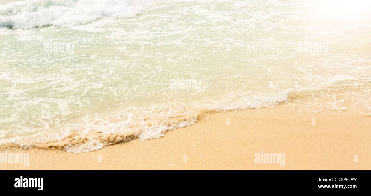 Tropical beach background with soft wave and white sand Stock Photo - Alamy