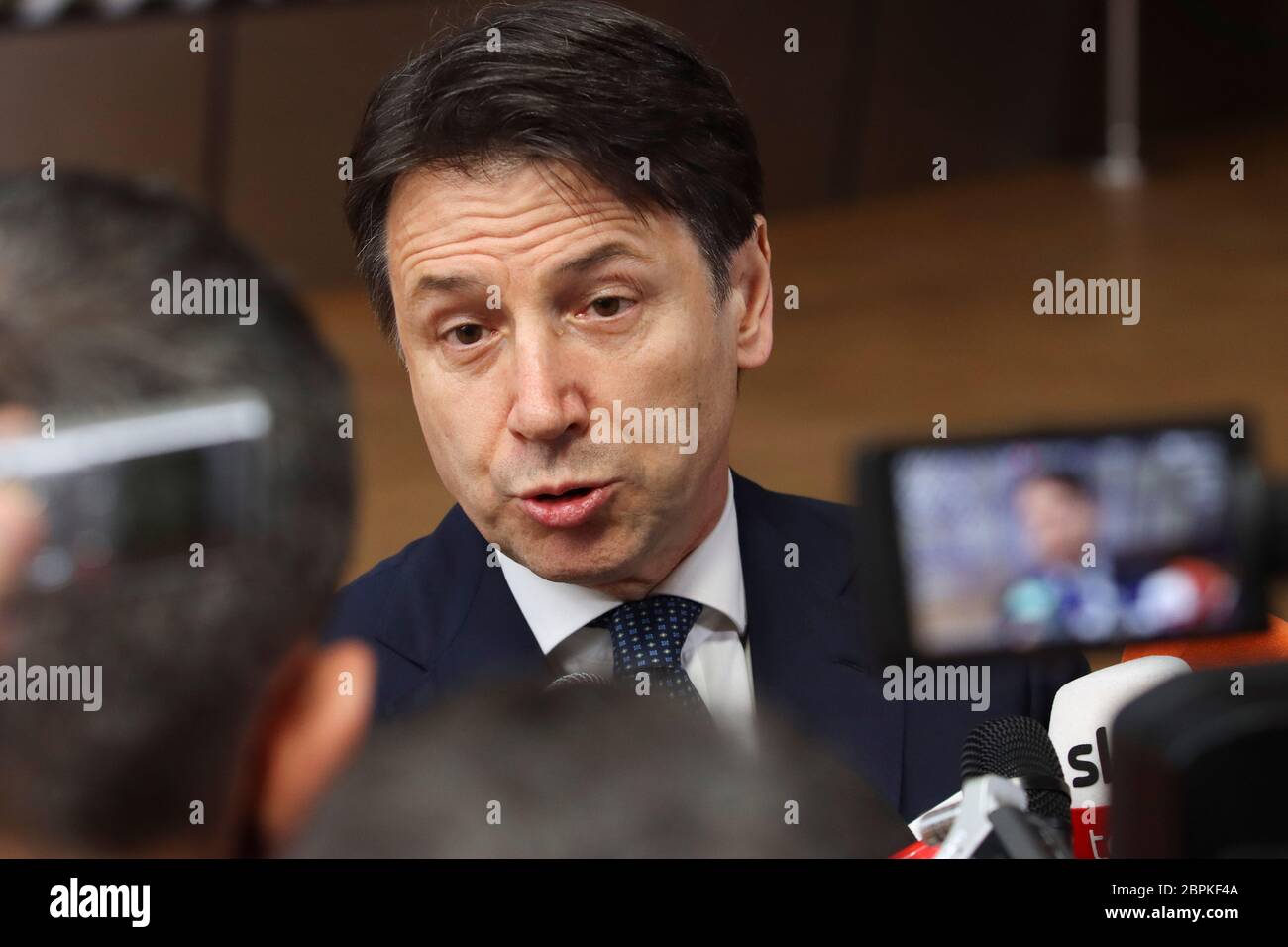 Giuseppe Conte, Prime Minister of Italy talking to the media, a doorstep press statement at the European Council Summit, EU leaders meeting. Stock Photo