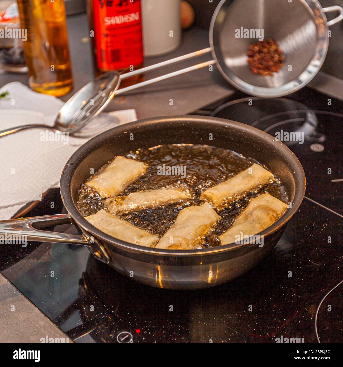 Cooking And Deep Frying In Fatiscent Big Pan Or Wok, Street Food Stall In  India, Junk Unhealthy Eating. Fire Coming Out Below The Pan. Stock Photo,  Picture and Royalty Free Image. Image