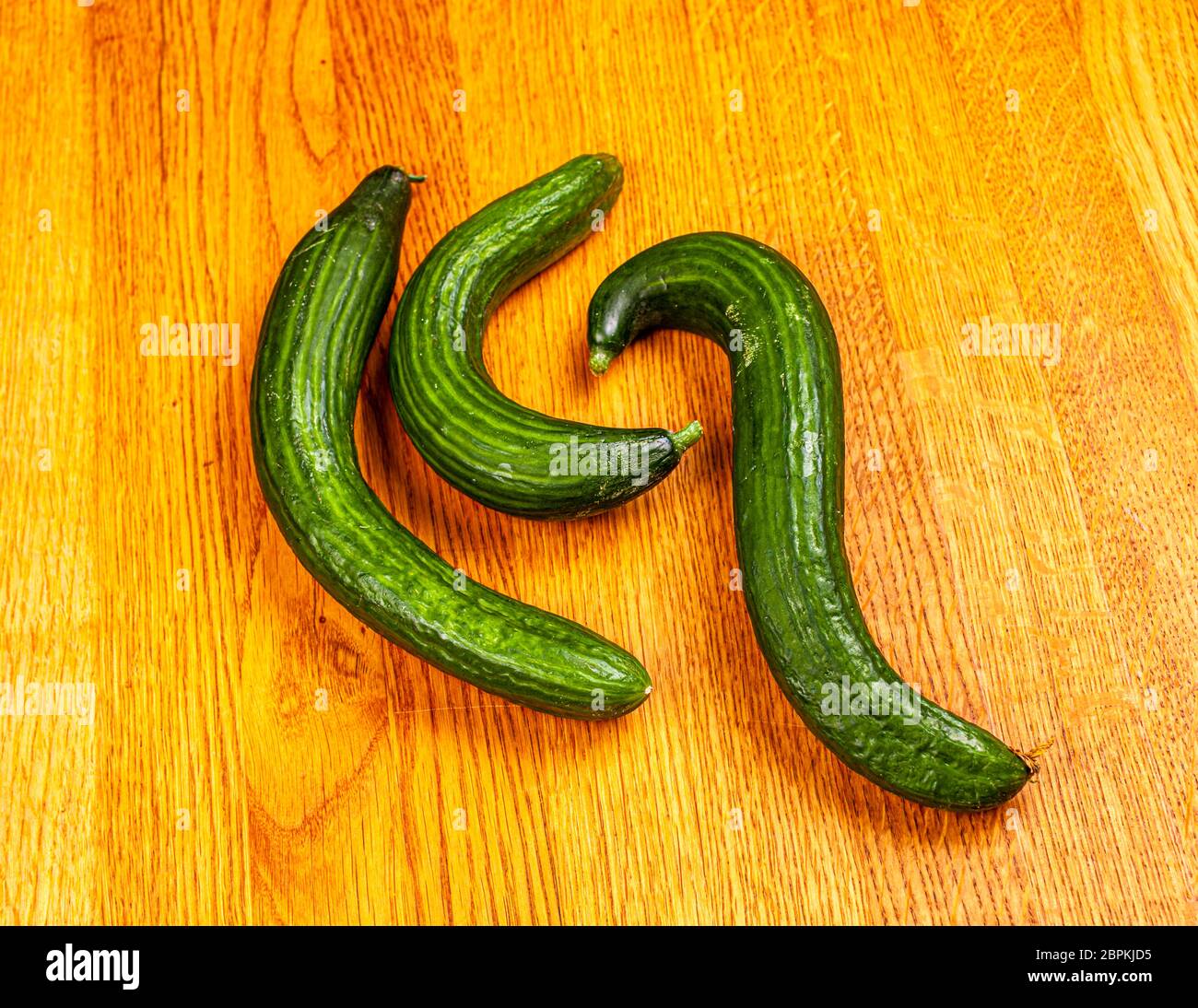 Misfits. Uneven Cucumbers in Grevenbroich, Germany Stock Photo
