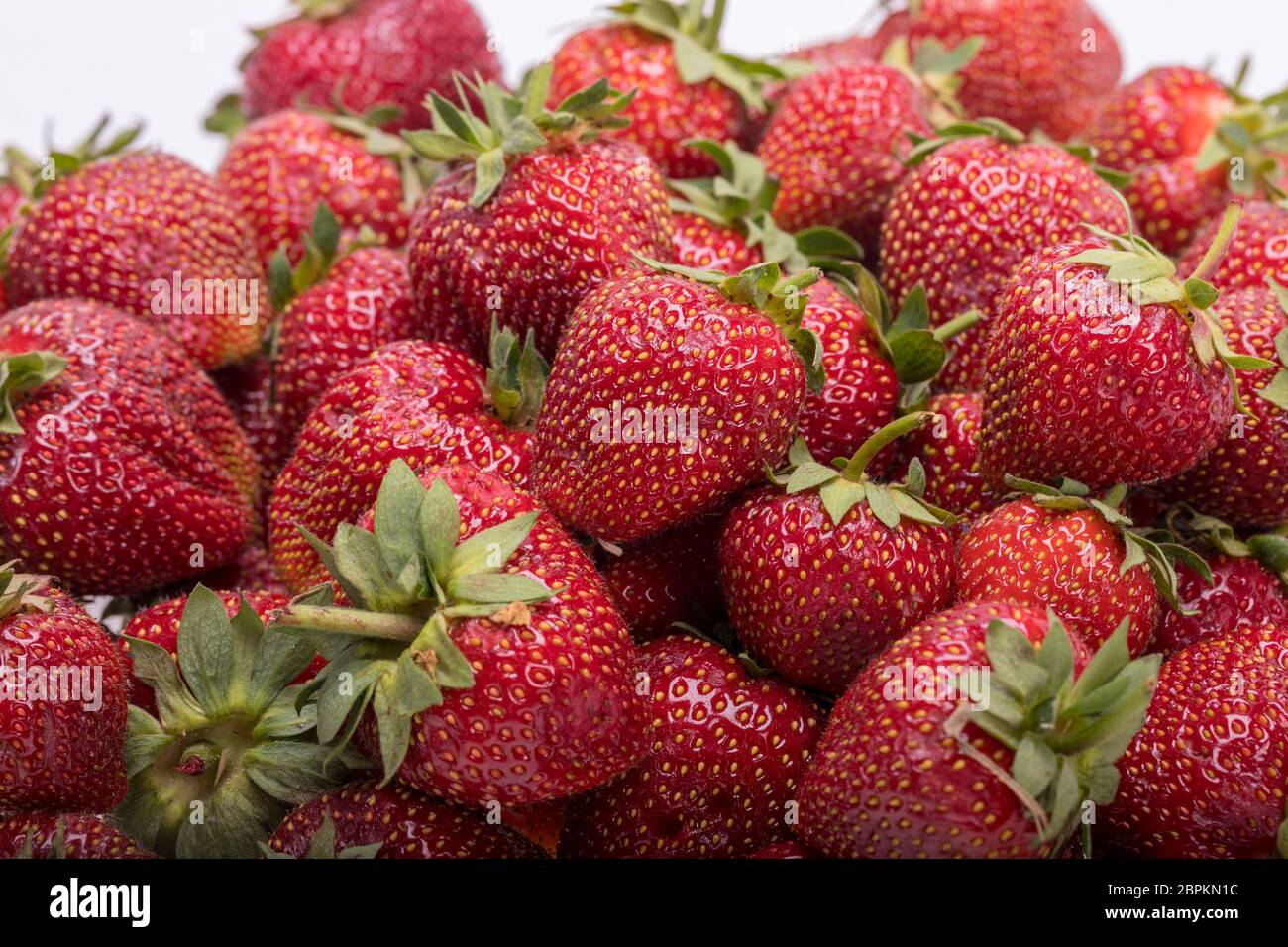 fresh ripe strawberries isolated on white background Stock Photo - Alamy