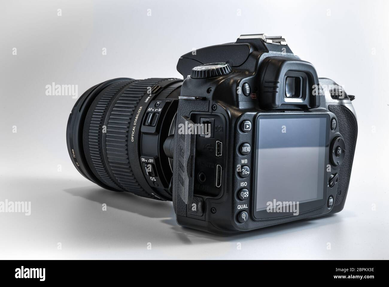 Close-up of a professional digital dslr camera for photography students, freelance photo journalism, photographic bloggers, or creative travel photogr Stock Photo