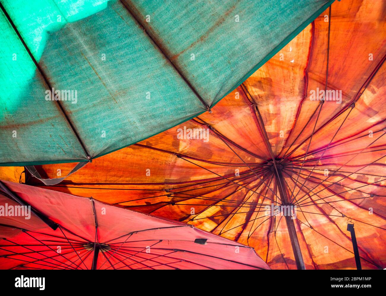Colorful asian parasols in the street market Stock Photo