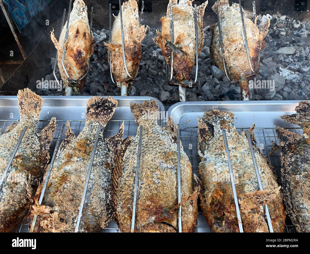 Barbecue Fish With Salt Crust, thai food on grill Stock Photo - Alamy