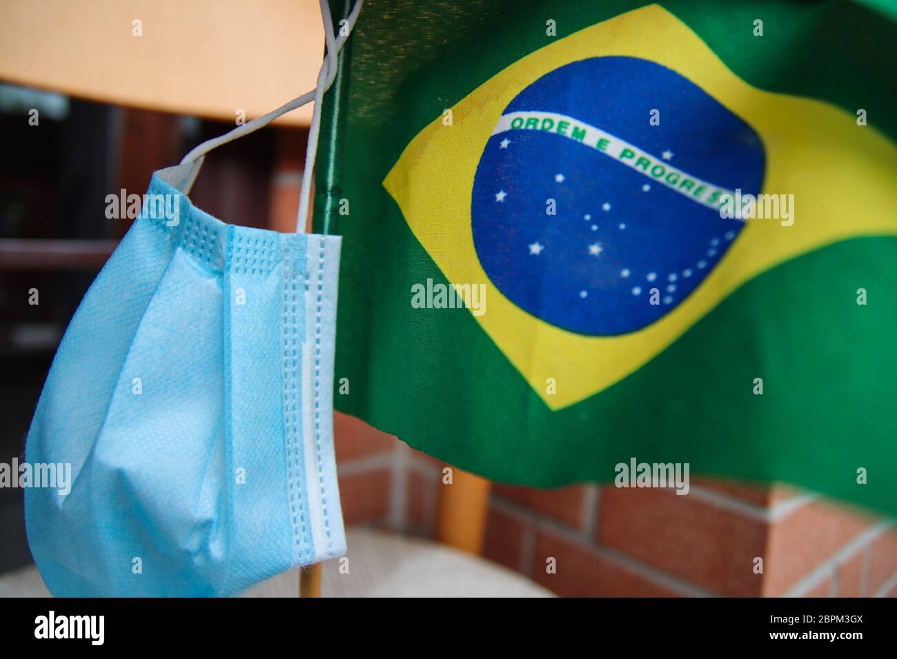 flag of Brazil and surgical mask for Coronavirus Prevention - Covid19 pandemic Stock Photo