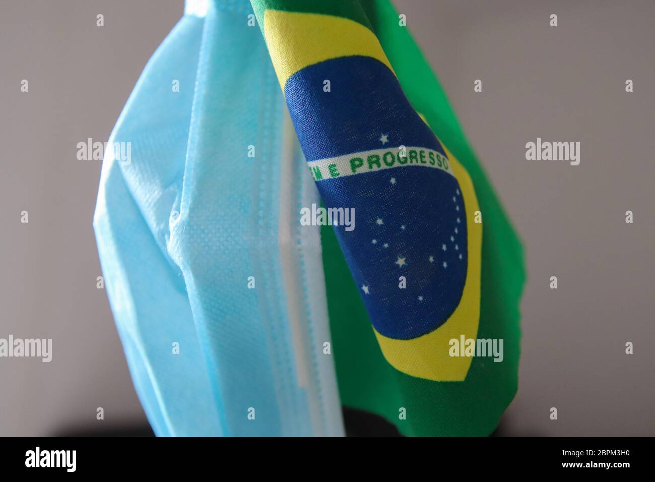 flag of Brazil and surgical mask for Coronavirus Prevention - Covid19 pandemic Stock Photo