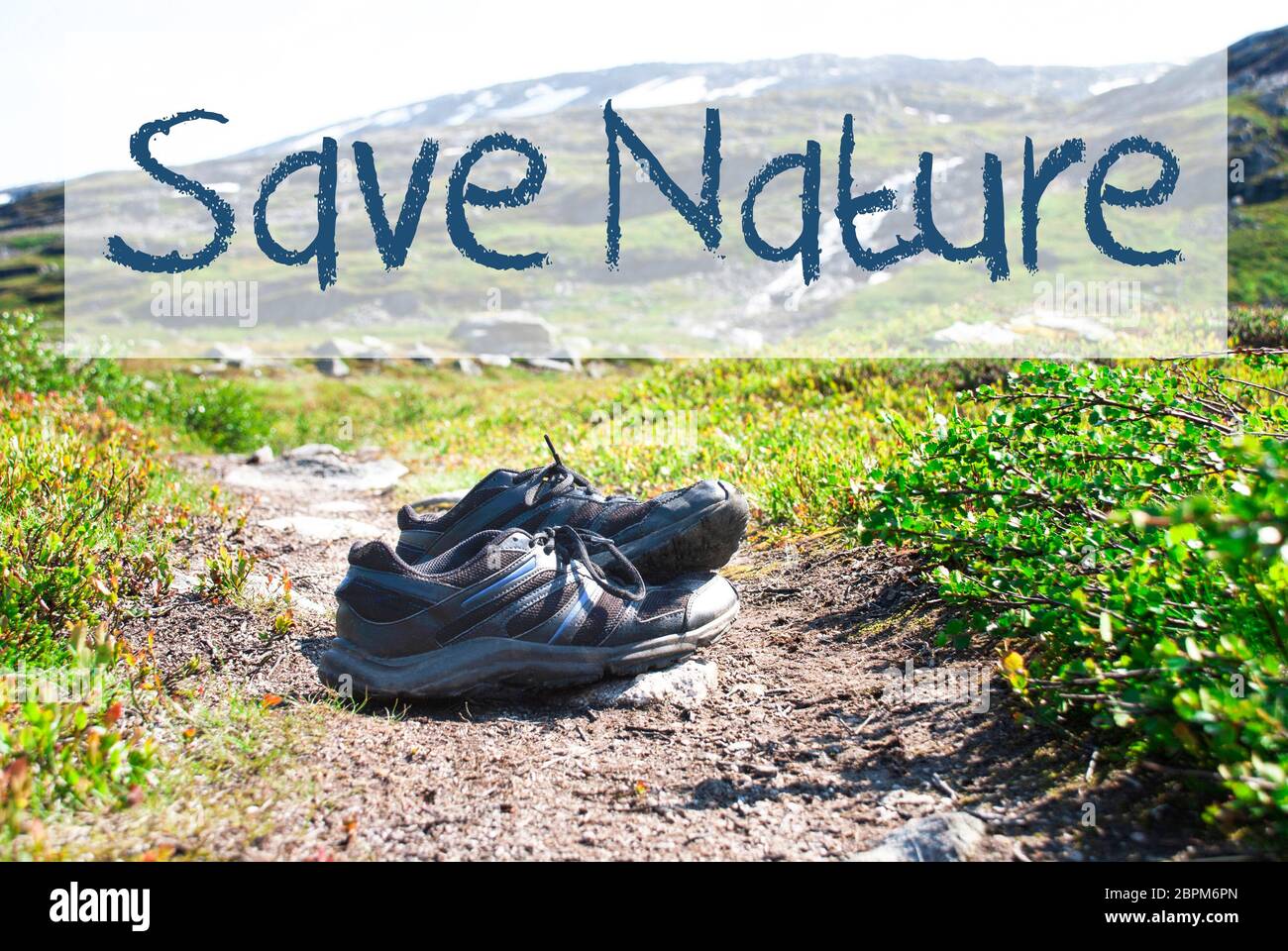 English Text Save Nature. Trekking Shoes On Hiking Path In Norway
