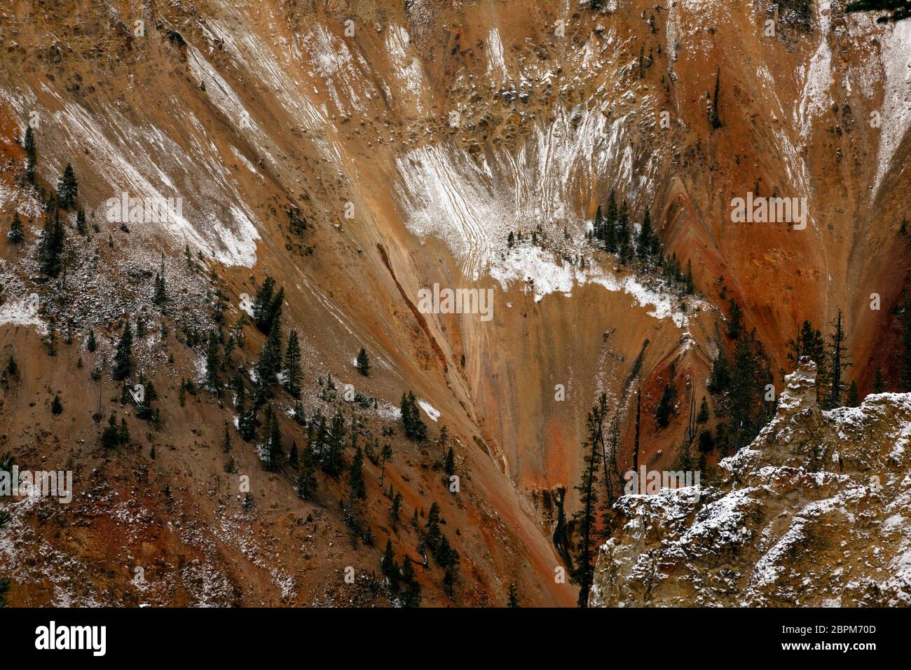 WY04412-00...WYOMING - Snow on the colorful walls of the Grand Canyon of the Yellowstone below Artist Point in Yellowstone National Park. Stock Photo
