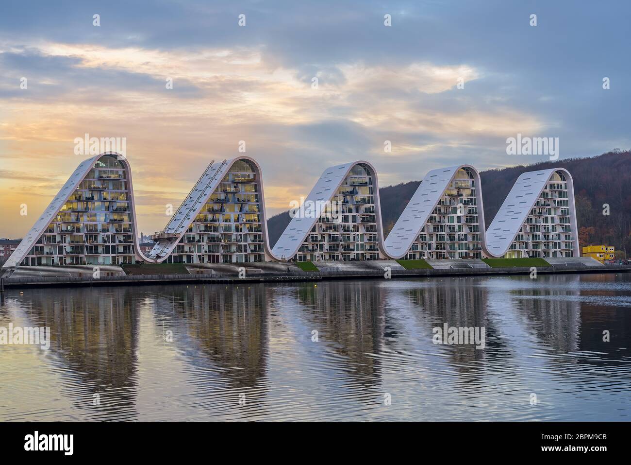 Danish modern house design, five watwerfront waves in the morning light  reflecting in the sea, Vejle, Denmark, November 15, 2018 Stock Photo - Alamy