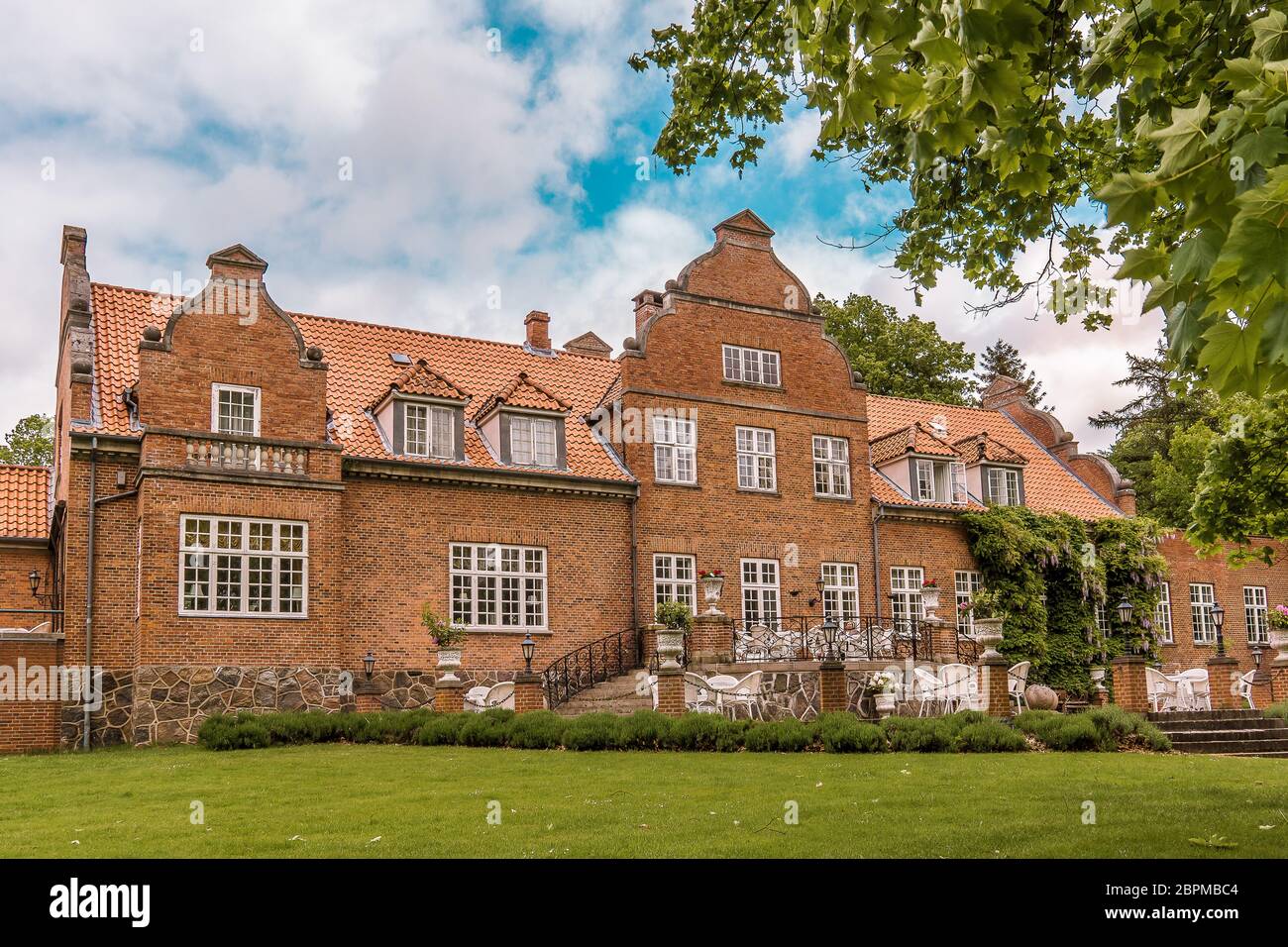 Sautehus castle with a cozy atmosphere. Built in 1912 by a grain dealer in North Zealand, Denmark, May 31, 2017 Stock Photo