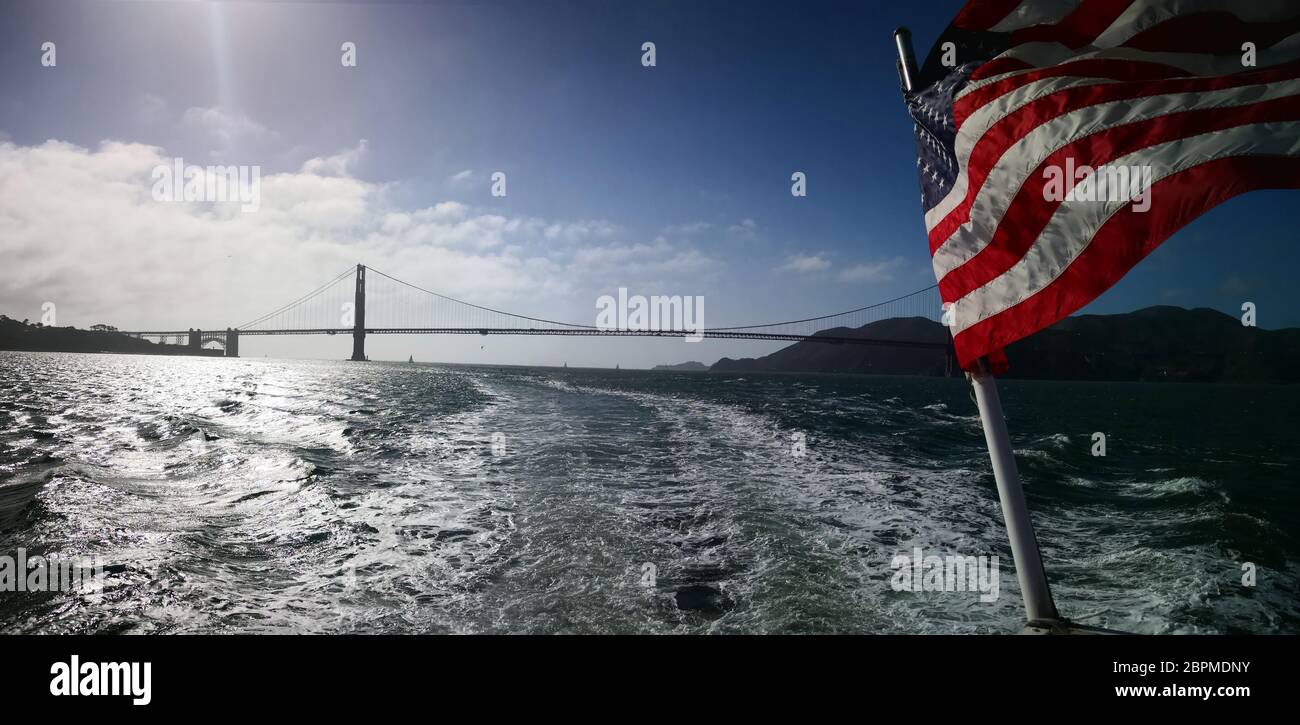 Boat tour to the Golden Gate Bridge - suspension bridge at the entrance to the San Francisco Bay Area - across the Golden Gate in California, USA Stock Photo