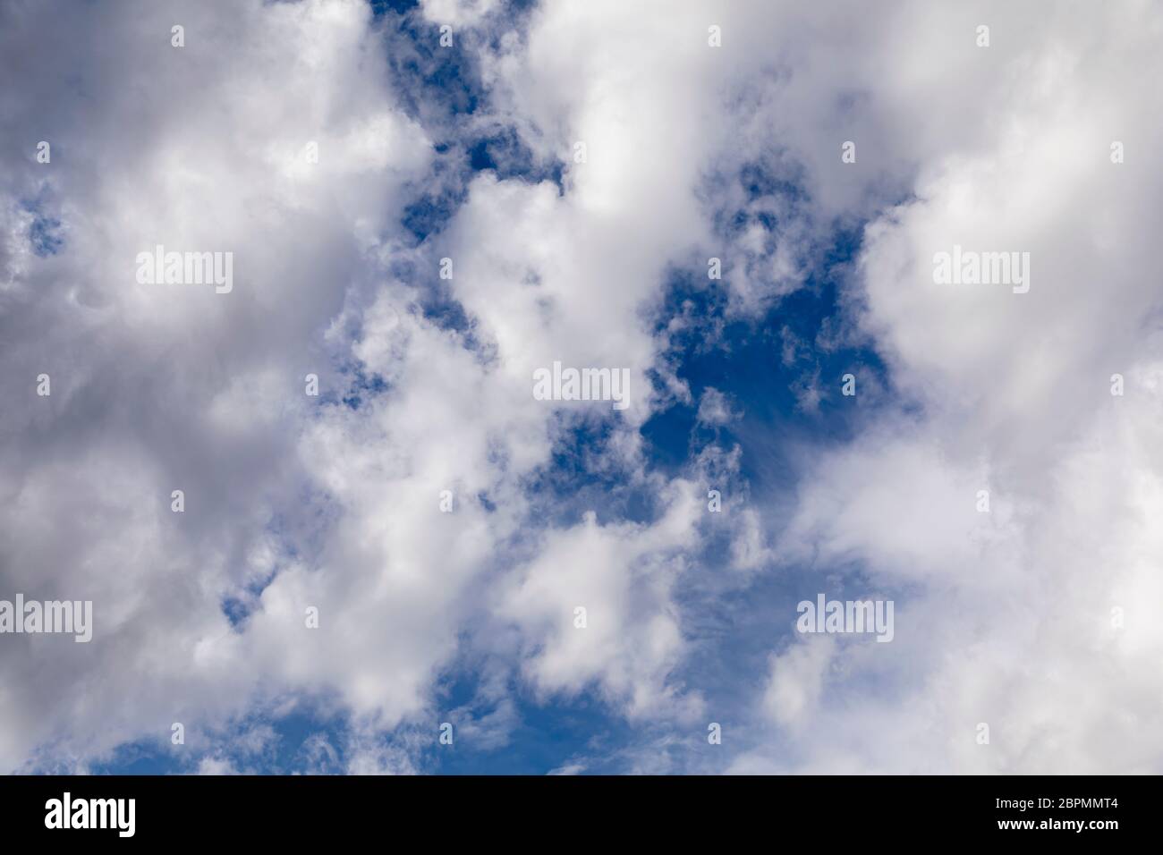 Clear blue sky and white clouds summer background Stock Photo - Alamy