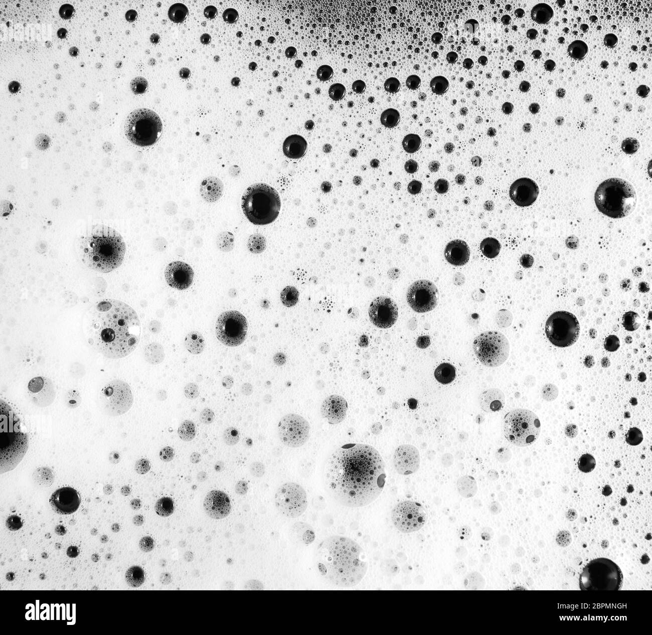 Foam with bubbles. Soap sud. Abstract background. Shampoo in water. Flat lay Stock Photo