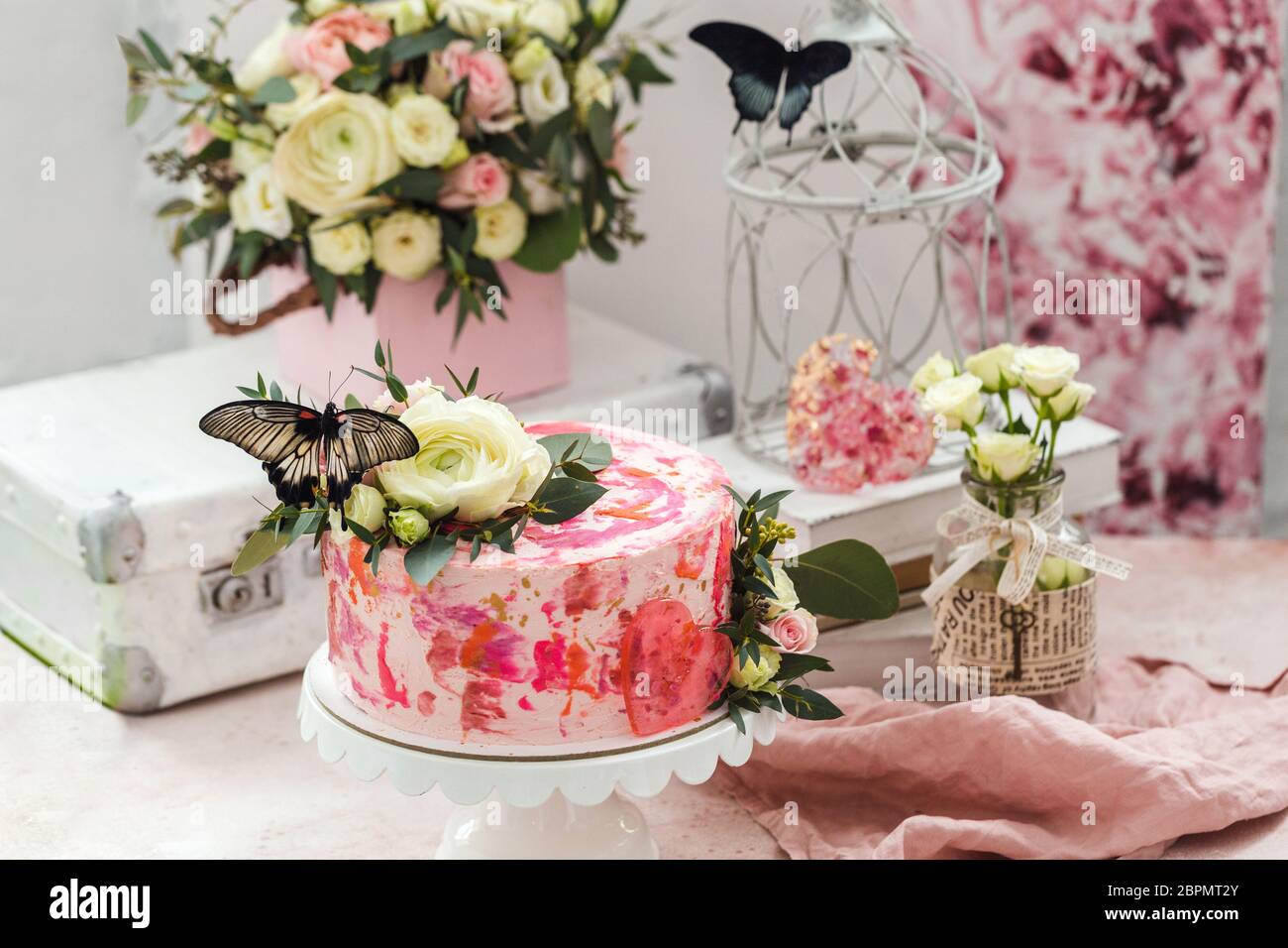Pink cake decorated with flowers and real butterflies rose romantic ...