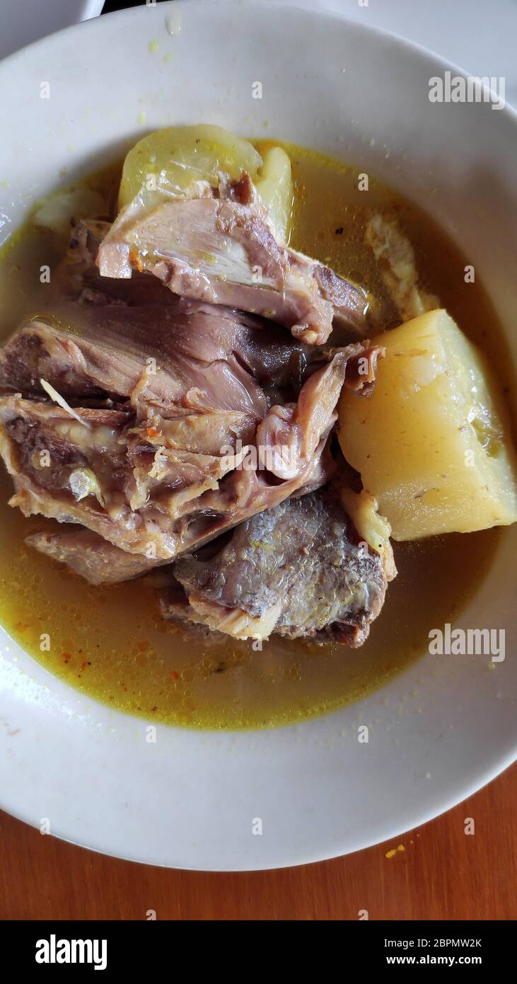 Fish head soup served in street shop in Bali Stock Photo Alamy