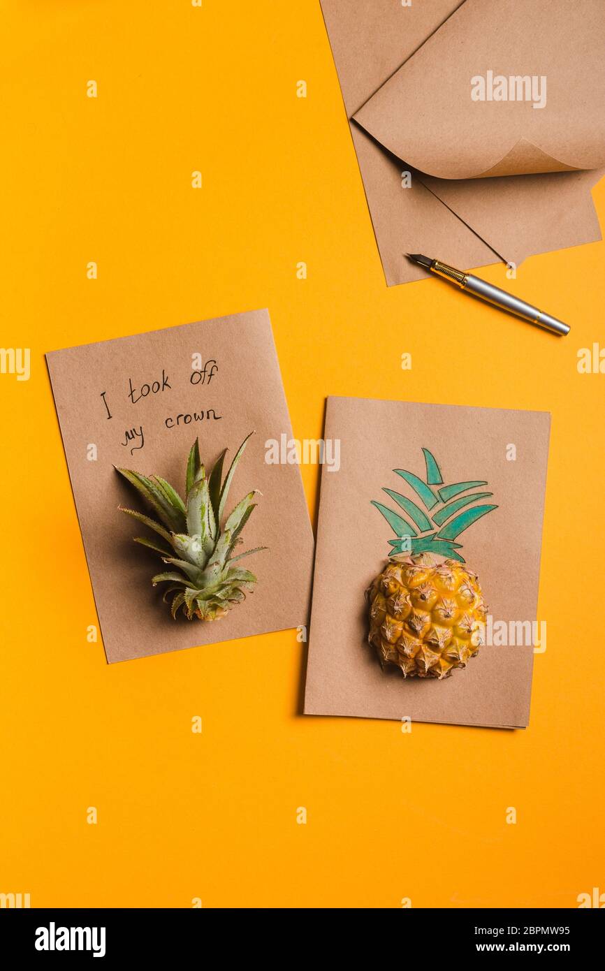 creative tropical greeting cards with pineapple and its crown Stock Photo
