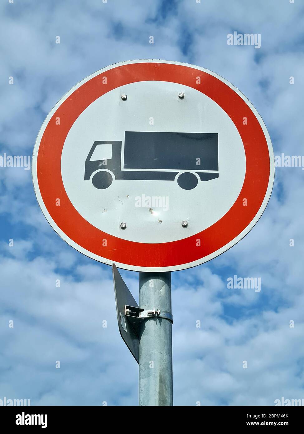 Truck sign against a cloudy sky Stock Photo - Alamy